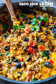 taco rice skillet with black olives and peppers