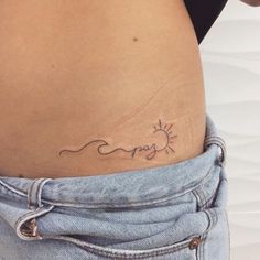 a woman's stomach with the word enjoy written in cursive writing on it