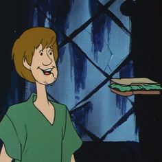 a cartoon character holding a sandwich in his hand