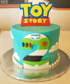 a toy story themed birthday cake on a table