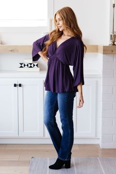 Freshen up your wardrobe with this Love On The Line V-Neck Peplum Blouse! Made from a slinky knit, this beautiful purple blouse features a v-neckline, dolman sleeves, and a flattering peplum style. Look your best with this stylish and comfortable blouse! Slinky Knit V-Neckline 3/4 Length Dolman Sleeves Peplum Silhouette 95% Polyester, 5% Spandex True to Size S: Chest 44" Waist 26"-36" Length 25"M: Chest 46" Waist 27"-37" Length 25.5"L: Chest 48" Waist 28"-38" Length 26"XL: Chest 52" Waist 32"-42 Georgia Fashion, Comfortable Blouses, Athleisure Tops, Peplum Styling, Peplum Styles, Purple Blouse, Peplum Blouse, Judy Blue Jeans, Denim Leggings