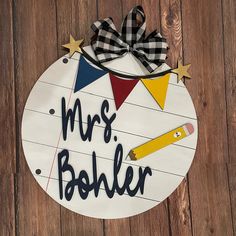 a wooden sign that says mrs boehler on it