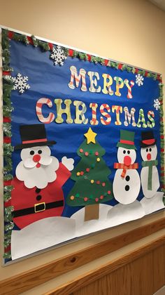 a christmas bulletin board with santa and snowmen in front of the words merry christmas