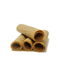 three rolled up cinnamons sitting on top of each other in front of a white background