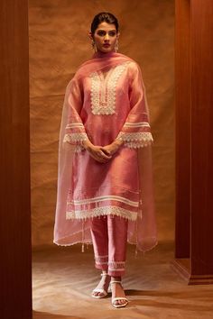 Pink straight kurta with botanical print and lace work. Paired with a pant with scallop lace and dupatta with placement lace work. Comes along with a separate slip.
Components: 4
Pattern: Print
Type Of Work: Botanical
Neckline: V neck
Sleeve Type: Bell Sleeves
Fabric: Organza
Color: Pink
Other Details: 
Model height: 5ft 9inches, wearing size XS
Ombre dupatta
Occasion: Puja - Aza Fashions V Neck Pakistani Suit Design, Bell Sleeves Suit Design, Suit Sleeves Designs Indian Style, Straight Suit Designs With Pants, Organza Sleeves Style For Kurti, Bell Sleeves Suit, Indian Designer Suits Party Wear Beautiful, Lace Kurta Designs Women, Kurti With Lace Design