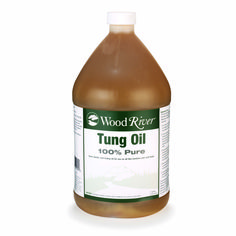 a bottle of wood river tung oil on a white background