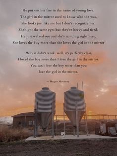 two silos sitting in front of a sunset with a poem written on the side