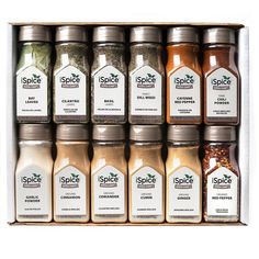 an open spice box filled with lots of different spices and seasonings on top of each other