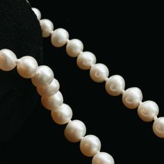 A modern take on a classic staple featuring lustrous white pearls. These luxurious pearl necklaces are hand-knotted on silk, accented with an antique 14k gold basket clasp. The necklace length makes the pearls easy to wear and layer with other pieces. Hand-strung on silk Measures approx. 17" long Finished with an antique 14k clasp Custom lengths available Because our pieces are all made entirely by hand we can offer a huge array of customization! If you have inquiries about custom sizing, stone Luxury Single Strand Round Beaded Necklace, Elegant Silver Hand-strung Beaded Necklaces, Elegant Silver Beaded Necklaces Hand-strung, Formal Pearl Necklace With Polished Beads, Luxury Hand-strung Necklaces For Formal Occasions, Luxury Hand-strung Necklaces For Formal Events, Luxury Hand-strung Necklace For Formal Occasions, Timeless Single Strand Round Necklace, Elegant Handmade Beaded Necklace For Formal Occasions