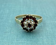 Vintage garnet and seed pearl ring 14K yellow gold. Circa 1930's. Current finger size is 7.75. Sizing increases delivery up to two weeks and is non returnable.  Condition is Very Good.  Happy to answer any questions pre purchase. Gross weight is 3.4 grams. Diamond Drop Pendant, Seed Pearl Ring, White Gold Chains, Tiny Diamond, Heart Pendant Diamond, Red Band, Diamond Drops, Seed Pearl, Vintage Bohemian