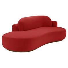 a red couch sitting on top of a white floor