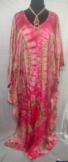 Beautiful handmade tie and dye kaftan One size fits all Comes with a matching scarf Floor length 61 Made with silk tye and dye material Long Tie Dye Free Size Kaftan, Tie Dye Long Kaftan Free Size, Long Tie Dye Kaftan Free Size, Tie Dye Kaftan With Natural Dye, Casual Tie-dye Kaftan For Spring, Spring Casual Tie-dye Kaftan, Casual Long Tie-dye Kaftan, Bohemian Tie-dye Batik Print Kaftan, Hand-dyed Tie-dye Kaftan For Beach