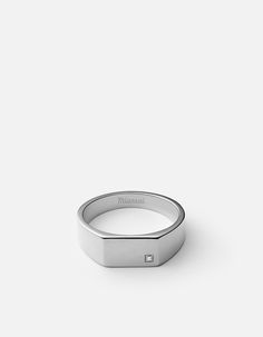 Our Geo Signet Ring is an exploration of the endless shapes around us. We reworked the classic circular signet style through the use of a three dimensional shape, the rectangular prism. This sleek, low-key design was made with the modern minimalist in mind. Made in sterling silver, enhanced with a diamond. Our diamonds are conflict free ethically sourced. [tab]Specifications[/tab]Base Metal: Sterling SilverPlating: RhodiumMaterial: 1 DiamondDimensions: L: 9.9mm x W: 7mmGauge: 1.5mmTotal Carat We Mens Designer Jewelry, Rectangular Prism, Silver Ring Designs, Signet Ring Men, Sterling Silver Mens Rings, Silver Signet Ring, Silver Wedding Rings, Mens Silver Rings, Wedding Ring Designs