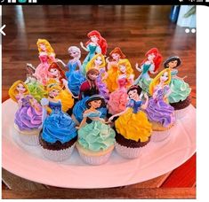 there are many cupcakes that have princesses on them