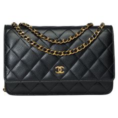 Lovely​​​ ​​​Chanel​​​ ​​​Wallet​​​ ​​​On​​​ ​​​Chain(WOC)​​​ ​​​shoulder​​​ ​​​bag​​​ ​​​​​​ ​​​in​​​ ​​​black​​​ ​​​quilted​​​ ​​​caviar​​​ ​​​leather,​​​ ​​​gold​​​ ​​​metal​​​ ​​​trim,​​​ ​​​a​​​ ​​​gold​​​ ​​​metal​​​ ​​​chain​​​ ​​​handle​​​ ​​​interlaced​​​ ​​​with​​​ ​​​black​​​ ​​​leather​​​ ​​​allowing​​​ ​​​a​​​ ​​​shoulder​​​ ​​​or​​​ ​​​crossbody​​​ ​​​carry Closure​​​ ​​​by​​​ ​​​flap​​​ ​​​in​​​ ​​​gold​​​ ​​​metal A​​​ ​​​patch​​​ ​​​pocket​​​ ​​​on​​​ ​​​the​​​ ​​​back​​​ ​​​of​ Black Bag With Gold Chain, Chanel Black Bag, Bags Wishlist, Purse Chanel, Chanel Wallet On Chain, Chanel Woc, Chloe Bags, Wicker Bags, Wallet On Chain