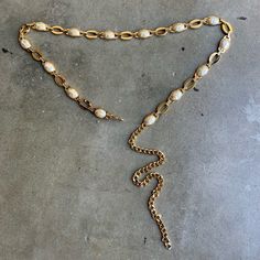 St. John Vintage Gold Chain Belt With Faux Mother Of Pearl Details Includes St. John Signature Throughout Adjustable Size 43in Length Good Vintage Condition, Some Faux Peal Paint Chipped, See Photos Elegant Gold Pearl Chain Belt, Chain Belt, See Photo, Vintage Gold, Mother Of Pearl, Gold Chains, Women Accessories, Chain, Women Shopping