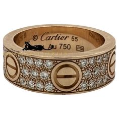 Brand: Cartier Model Name: Love Material: Rose Gold Metal Purity: 18k Stones: 66 diamonds Carat Weight: 0.77 ct Ring Size: 55 (euro) ; 7.25 (US) Ring Width: 6.5 mm Includes: Receipt of Purchase and Cartier Certificate Year Purchased: 2023 Luxury Cartier Diamond Ring With Vvs Clarity, Luxury Diamond Ring With Accents, Luxury Cartier Rose Gold Diamond Ring, Cartier Designer Diamond Jewelry, Designer Diamond Cartier Jewelry, Designer Cartier Diamond Jewelry, Luxury Diamond Ring With Pave Setting, Luxury Rose Gold Pave Diamond Ring, Luxury Rose Gold Diamond Ring With Pave Setting