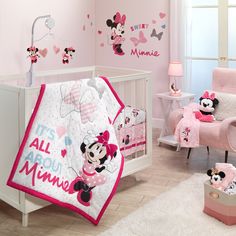 Script style “Minnie” along with tossed Minnie heads decorate this fitted crib sheetSoft microfiber materialElastic all the way around ensuring a safe and secure fitDurable and machine washable for easy careA favorite baby registry item","The fitted crib sheet is on a crisp white ground with tossed Minnie heads, pink hearts, the word Minnie in pink script along with geometric pink splatters. The fitted crib sheet has elastic all the way around ensuring a safe and secure fit on a standard-sized c Minnie Mouse Wall Decals, Minnie Mouse Nursery, Mouse Nursery, Pink Crib, Lambs & Ivy, Baby Minnie, Baby Minnie Mouse, Crib Bedding Set, Baby Crib Mobile