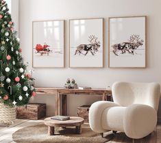 a living room decorated for christmas with three pictures on the wall