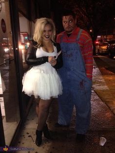 two people dressed up as chucky and bride of chucky from costume works on twitter