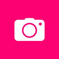 a pink background with a white camera on it