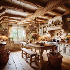 an old fashioned kitchen with wooden floors and white cupboards, chandelier above the island