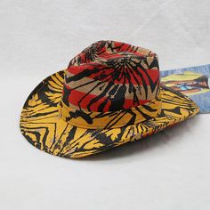 If you're looking to express your trend in a unique way, this unisex cowboy hat is a perfect choice. Made with high-quality paper, it adds a touch of style to your look. The vibrant print pattern and beautiful color make it a standout accessory. With its affordable price and stylish design, this cap is a must-have addition to your collection.Specifications Style: Casual Place Of Origin: China (Mainland) Pattern Type: Print Origin: Mainland China Material: Paper Item Type: Cowboy Hats Gender: Unisex Feature: Decorate Department Name: Adult CN: Zhejiang Brand Name: GeraldBlack Applicable Season: Four Seasons Applicable Scene: Party When purchasing clothing, shoes, and/or belts; please follow the size chart. Please click on "Size Charts" located on the menu bar to learn how to get your measur Short Brim Panama Hat For Western-themed Events, Multicolor Fedora With Short Brim For Rodeo, Casual Wide Brim Top Hat For Rodeo, Multicolor Short Brim Fedora For Rodeo, Black Straw Hat For Western-themed Summer Events, Western Style Top Hat For Summer Festivals, Multicolor Fedora With Curved Brim For Rodeo, Western Style Summer Festival Top Hat, Multicolor Flat Brim Straw Hat For Rodeo