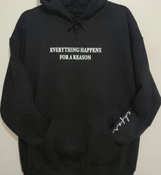 Part of the Ehfar Line. Hoodie available in black & white.  Middle placement on chest: EVERYTHING HAPPENS FOR A REASON On left sleeve (when wearing hoodie): ehfar written in script font on inner forearm 50% USA cotton, 50% polyester Pill-resistant air jet yarn Double-needle stitching throughout Double-lined hood Pouch pocket; matching drawcord Black Text Print Hoodie For Streetwear, Black Cotton Hoodie With Text Print, Black Hoodie Sweatshirt With Text Print, Black Text Print Hoodie Sweatshirt, Black Text Print Hoodie For Fall, Black Winter Hoodie With Slogan, Black Text Print Sweatshirt For Spring, Spring Black Sweatshirt With Text Print, Trendy Black Hoodie With Slogan