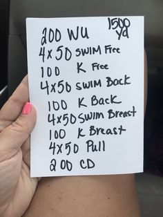 a person holding up a piece of paper with writing on it that says, 600 wu and 4x5d swim free