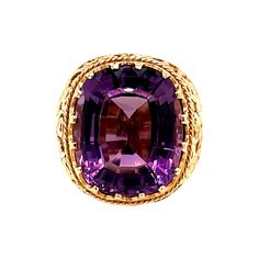 Vintage 1980's 15ct Cushion Cut Amethyst Ring - the amethyst weighs approximately 15ct and measures 17.6 x 14.8mm. The setting is an 18k yellow gold hand carved filigree setting with a finger size 8 which can be sized upon request. The ring weighs 10 grams Antique Jewelry Rings, Gold Hand, Amulets, Gold Hands, Amethyst Ring, Cushion Cut, Cocktail Rings, Vintage Watches, Sapphire Ring