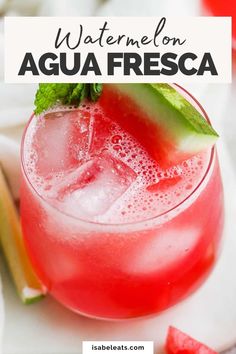 a watermelon agua fresca is garnished with mint and lime