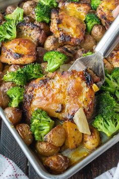 a pan filled with chicken, broccoli and potatoes