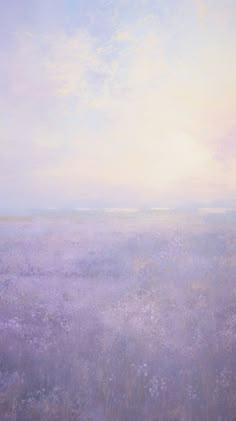 an oil painting of a field with purple flowers in the foreground and blue sky in the background