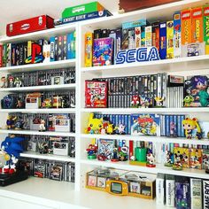 the shelves are filled with video game memorabilia