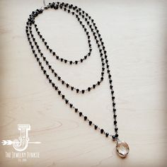 This black glass beaded triple chain is accented with a faceted glass pendant (may vary in size & shape) This necklace is 30" in length at the longest layer. Each later is approx. 6 inches shorter. 2 inch extender chain attached. Pendant is approx. 1.5 inches in length Although your item will resemble the photo, each piece is created by hand, so no two are identical.Thank you for visiting The Jewelry Junkie! Ecommerce Website Design, Long Layers, Layering Necklace, Faceted Glass, Glass Pendant, Black Glass, Glass Pendants, Layered Necklaces, 6 Inches