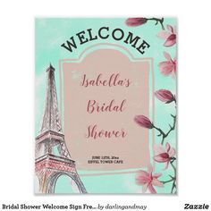 a welcome card with the eiffel tower and flowers in pink, green, and blue