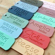 the name tags are all different colors and sizes