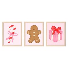 three gingerbreads and a candy cane are on the pink wall next to each other