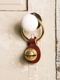 a door handle with a ball on it