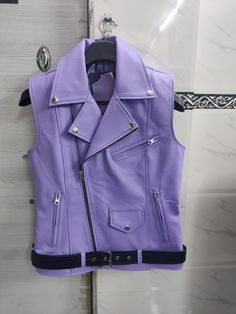 Description :  Material : Lambskin Leather  Color : Purple / Lavender  Closure : Zipper & Belt Size : All Size Available Season : Winter, Spring, Fall. Handmade Vest Waistcoat, Purple Biker For Her, Lambskin Design Leather Belted Vest Coat, Jacket For Classic Style Dear Customer, Please answer the below questions in order to serve you better :  Shoulder = Chest = Arms = Waist = Sleeves=  Tummy = Length of jacket =  HIP = Actual height =  Fitting = slim and regular Colour:  Color might slightly vary due to digital photography and monitor resolution Shipping Orders are shipped within 4-5 business days after cleared payment is received. Shipping Services                     Economy Shipping outside US - Normally we ship our products via India Post / Aramex , they deliver the items within 20-2 Outfit Biker, Handmade Vest, Black Color Combination, Biker Coat, Purple Vests, Classic Outfit, Vest Coat, Clothing Design, Vest Outfits