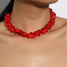 Make A Bold And Passionate Statement With Our Red Oversized Heart Beaded Necklace! This Stunning Piece Is A Celebration Of Love And Confidence, Designed To Steal The Spotlight Wherever You Go. The Vibrant Oversized Heart Beads Are A Symbol Of Your Fearless And Fiery Spirit. Whether You're Dressing Up For A Romantic Date Night Or Adding A Pop Of Color To Your Everyday Ensemble, This Necklace Is The Ultimate Choice. Wear Your Heart On Your Chest And Let Your Style Shine With This Eye-Catching Acce Party Beaded Necklaces With Heart Beads, Party Beaded Necklaces With Heart Pendant, Heart Beaded Necklaces For Valentine's Day Party, Trendy Red Round Bead Necklaces, Trendy Red Necklaces With Round Beads, Heart-shaped Beaded Necklace For Parties, Heart Pendant Necklace With Heart Beads For Party, Trendy Red Round Beads Necklace, Party Beaded Necklace With Heart Pendant