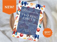 a circus themed birthday party card with an elephant on it and the text, twins two ring circus