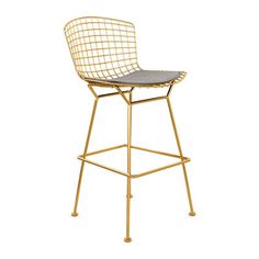 a gold metal bar stool with black leather seat and backrest, viewed from the front