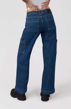 The Pheonix Cargo jeans are designed with laid-back appeal, featuring a mid-rise cut and large side pockets for a utilitarian-inspired fit. RUNS SMALL  - SIZE UP Mid-Rise Wide Leg Jeans  Front Rise: 9.5” Inseam: 31" Regular Hem Available in Plus Sizes: Size 24 - 42 Model is 5'9" Tall / Wearing a size 26 99% Cotton / 1% Spandex Machine wash cold / Tumble dry low Cargo Jeans, Nordstrom Store, Wide Leg Jeans, Leg Jeans, Mid Rise, Wide Leg, Nordstrom, Spandex, Plus Size