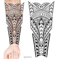 an arm tattoo with geometric designs on it and a hand that has the shape of a fox