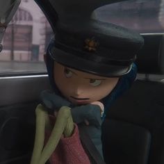 an animated character sitting in the back seat of a car