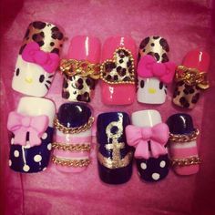 hello kitty nail art with bows and leopard print on them, all in different colors