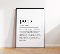 a black and white poster with the words pops on it in front of a wall