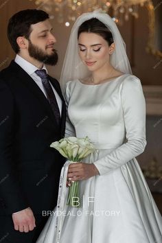 the bride and groom are standing together