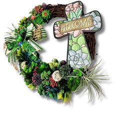 a wreath with the word welcome on it